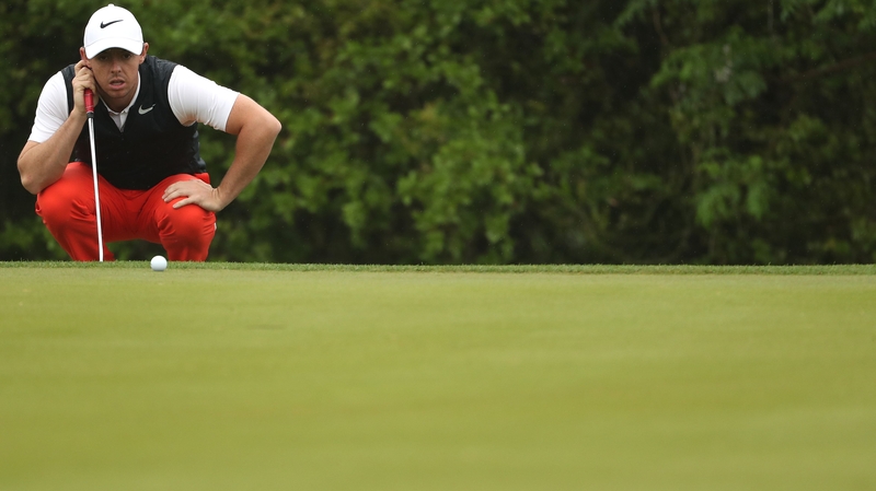 Rory McIlroy battled to stay in contention in Augusta