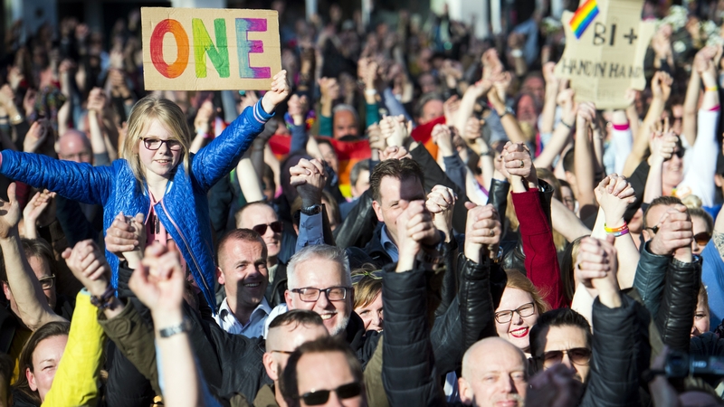 People hold hands during the Hand in Hand for Diversity demonstration in Arnhem