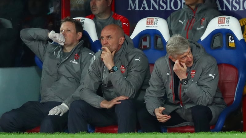 Arsene Wenger looks away as his team crashes to another defeat, this time to Crystal Palace