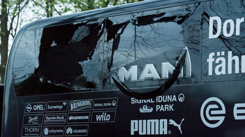 Explosive devices detonated while Dortmund's team bus was en route to a Champions League match