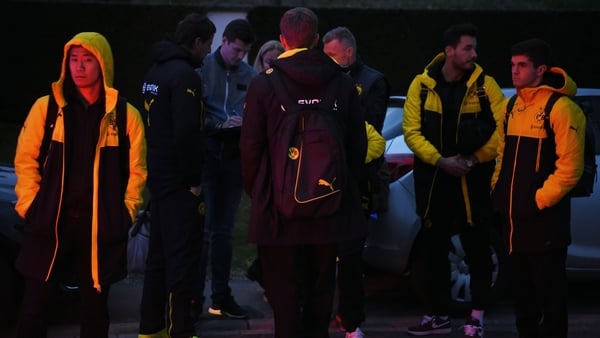 Borussia Dortmund's team wait after the team bus