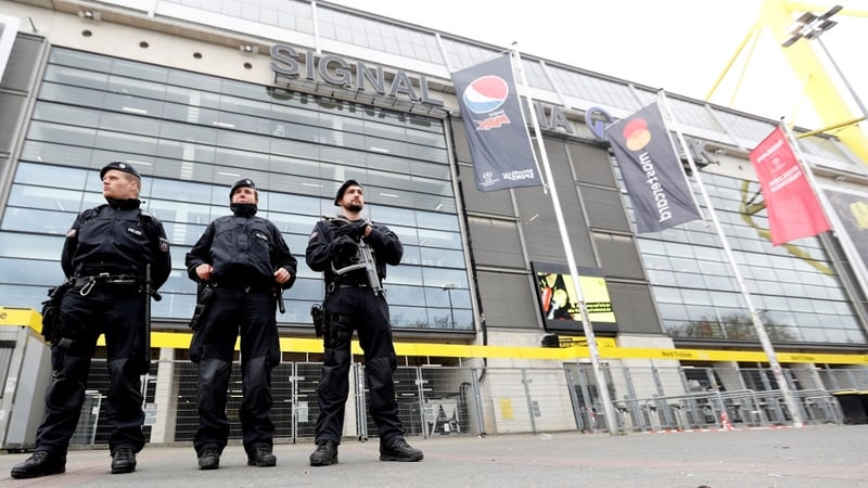 Police secure the stadium ahead of the rescheduled UEFA Champions League quarter final between Borussia Dortmund and AS Monaco
