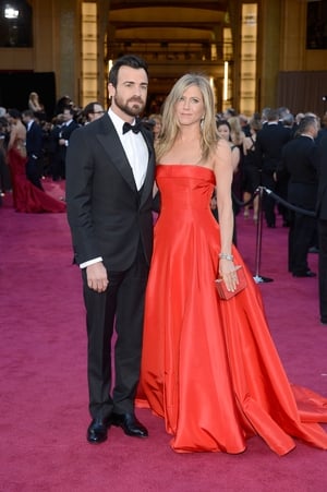 Hollywood chic at its best! The couple was attending the Oscars ceremony in 2013 in a Salvatore Ferragamo suit for him, and in a princess Valentino gown for her.