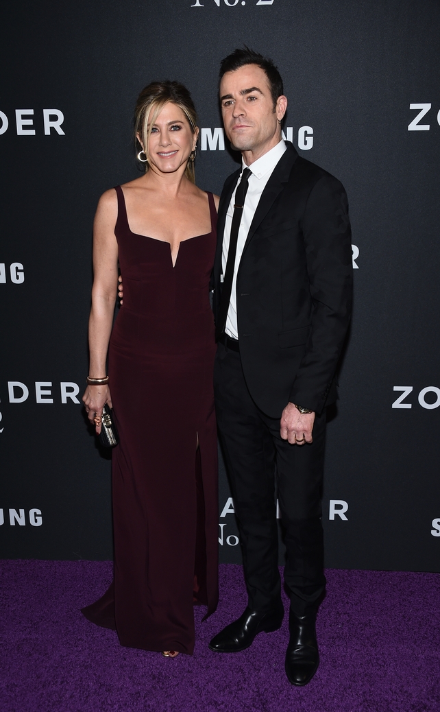 Galvan burgundy dress and Valentino suit is the perfect combo for the couple at the 'Zoolander 2' World Premiere in 2016!