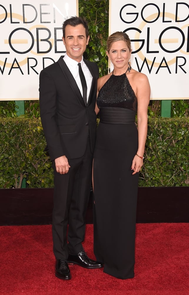 Jen in a Custom Saint Laurent dress at the Golden Globes ceremony in 2015 with Justin beaming at her side. Wouldn't you love to hear their banter in these moments!