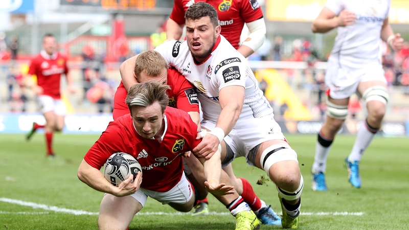 Angus Lloyd crosses the line for Munster