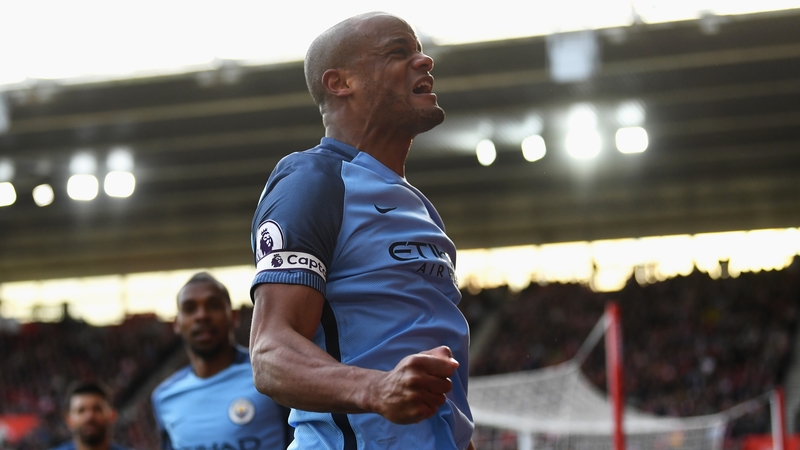 Vincent Kompany celebrates his opener in front of the City fans