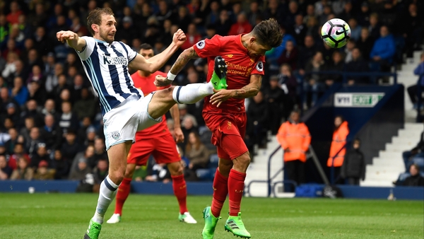 Roberto Firmino heads in on the stroke of half-time