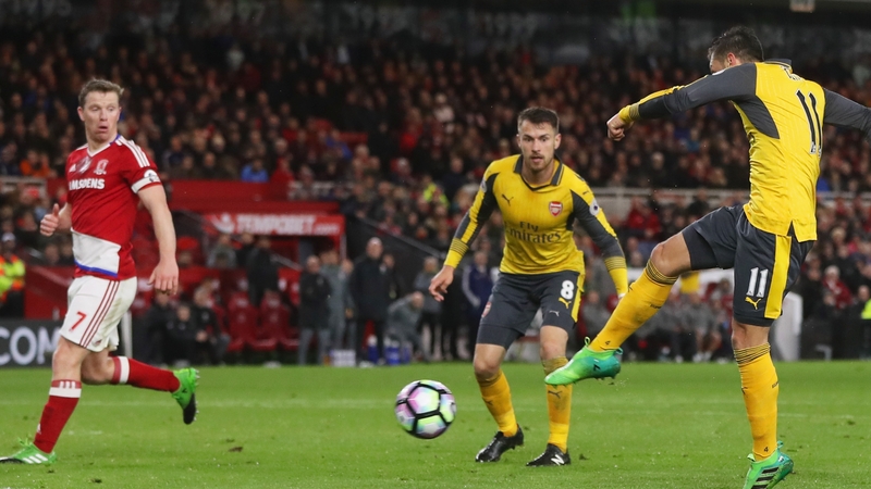 Mesut Ozil fires home the Arsenal winner
