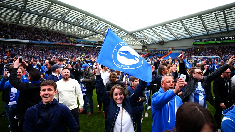 Brighton fans celebrate sealing promotion