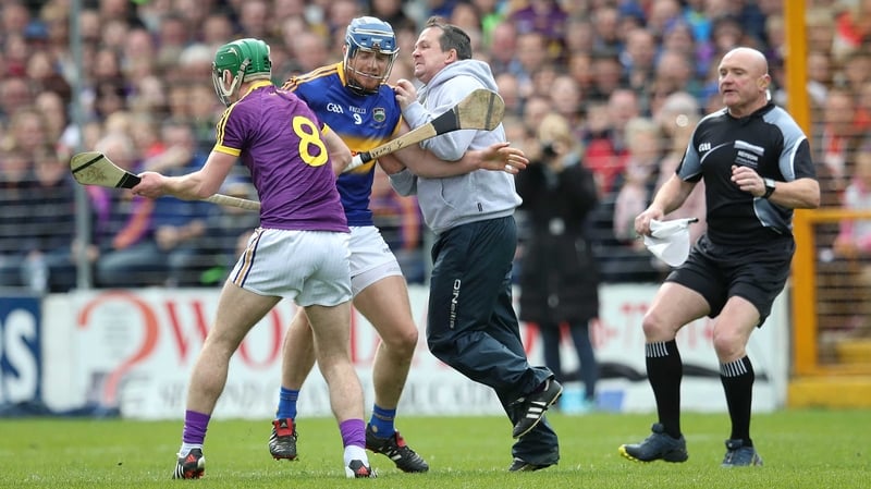 Jason Forde tangles with Davy Fitzgerald at Nowlan Park
