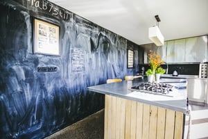 The kitchen had personalised touches such as this chalkboard wall.