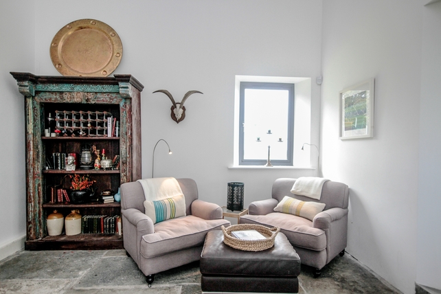 This home may look like a traditional farm cottage to anyone passing by but the interior is another story.
