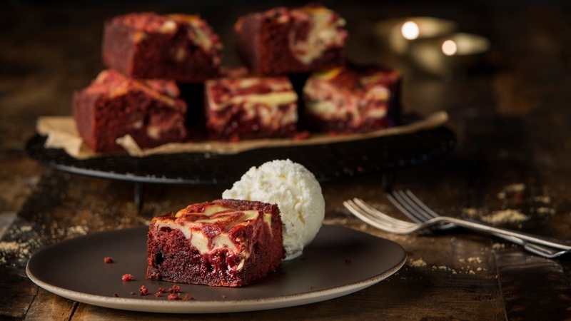 Put a new twist on red velvet cake with these chewy, moist and decadent delights, which are swirled with a smooth layer of cream cheese. Bake a batch and you are sure to earn brownie points!