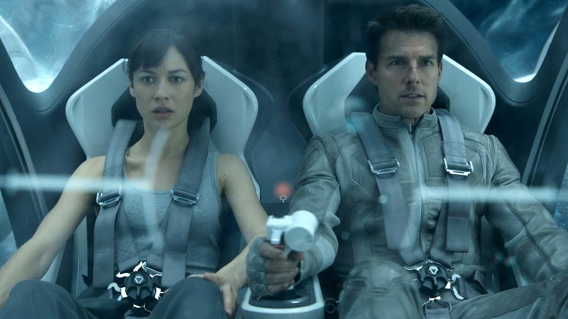 Tom Cruise (right), pictured with Olga Kurlylenko in Oblivion