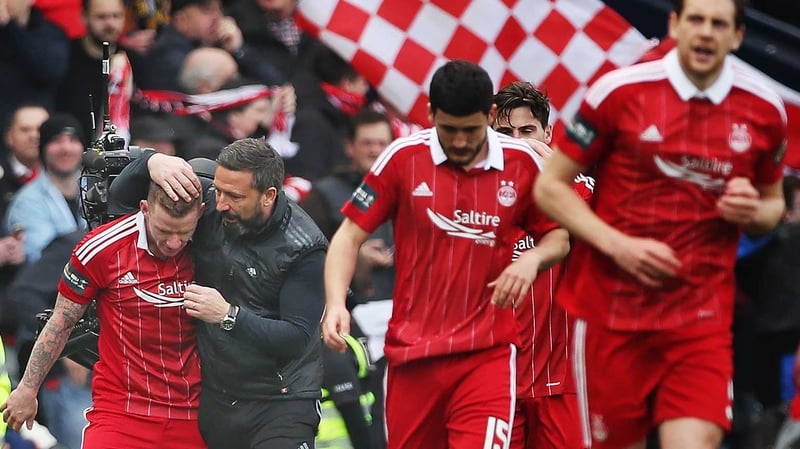 Aberdeen manager Derek McInnes congratulates Jonny Hayes