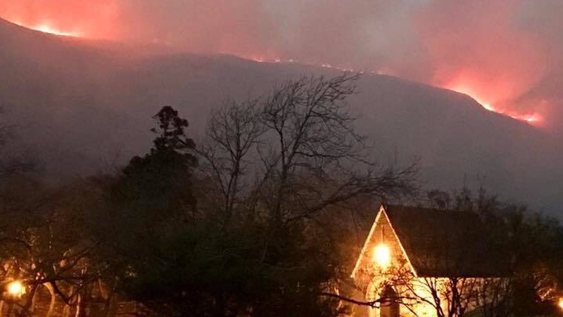 Locals are concerned a change in wind direction could push the fire towards the forest