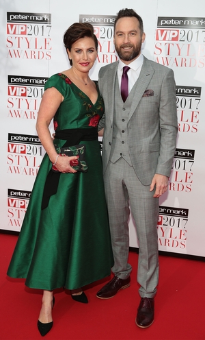 RTÉ 2fm's Keith Walsh with Suzanne Hennesy who wore a dress from GO Meara designs.