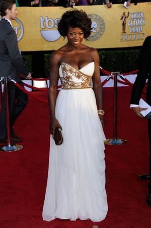 The actress is angelic in this immaculate Marchesa gown enhanced with golden embroideries at the SAGs ceremony in 2012. Viola won the award for her Outstanding Performance by a Female Actor in a Leading Role in 'The Help'.