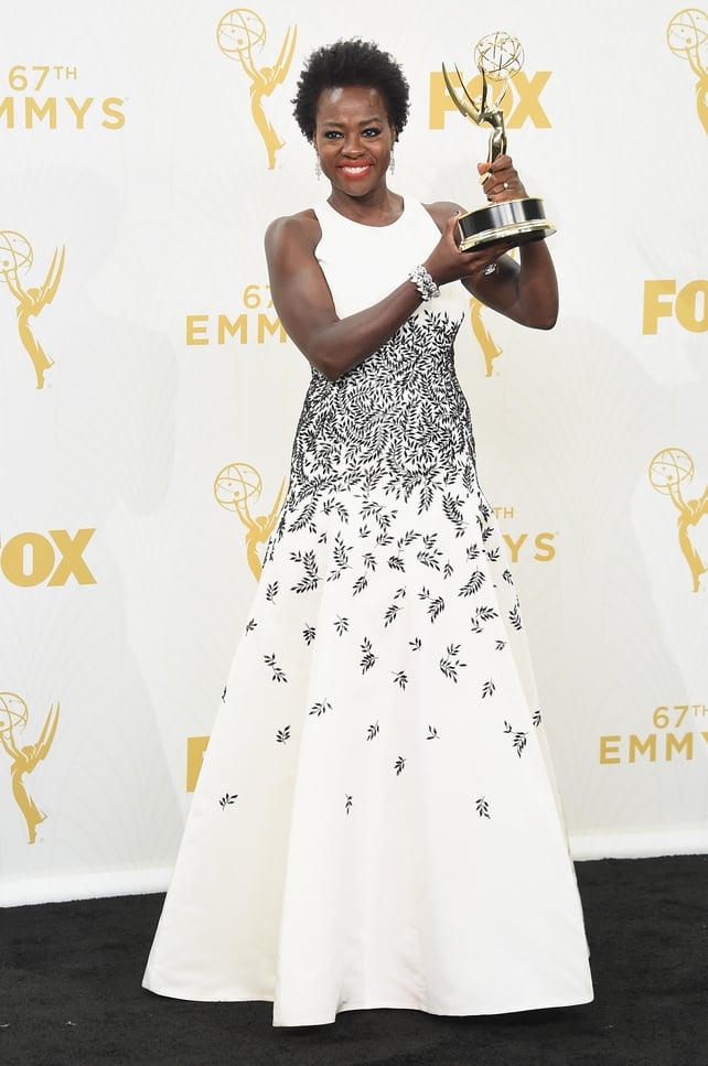 Viola won the award of Outstanding Lead Actress in a Drama Series for the 'How to Get Away with Murder' TV series in 2015. She's proudly holding her award in a delicate Carmen Marc Valvo gown and looks so chic as always.