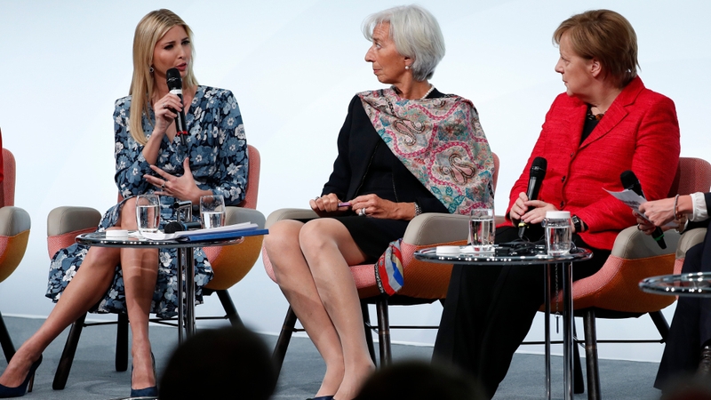 Christine Lagarde (C) and Angela Merkel (R) listen as Ivanka Trump addresses the summit