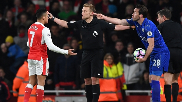 Sanchez and Christian Fuchs protest to the officials