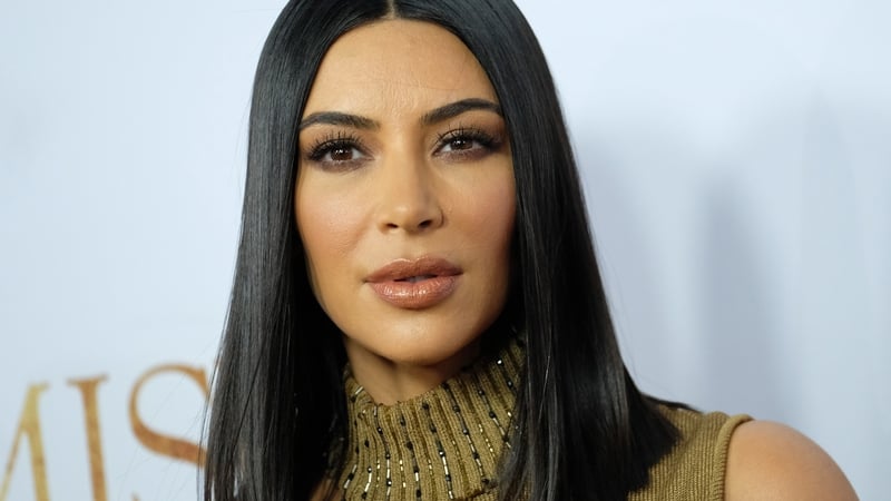 Kim Kardashian says she is "such a better person" since robbery