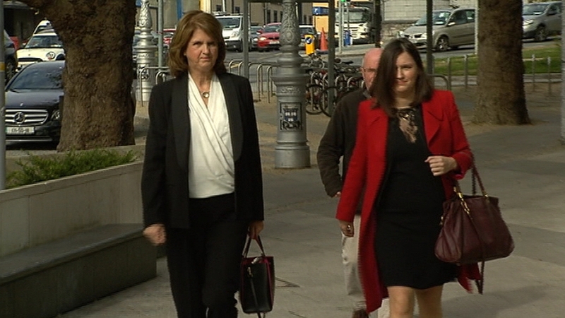 Joan Burton has begun by outlining the circumstances surrounding her attendance at a graduation ceremony