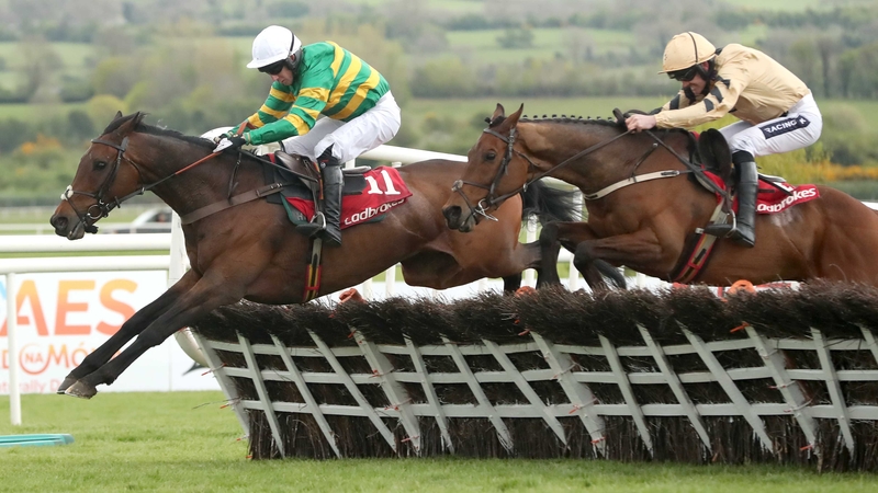 Unowhatimeanharry leads Nichols Canyon over the last at Punchestown