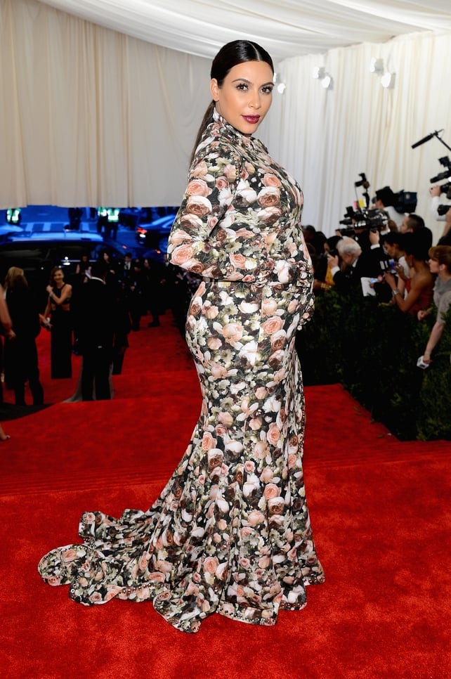 Kim Kardashian had everyone talking at the 2013 Met Gala wearing this floral Givenchy dress. Theme: PUNK: Chaos to Couture