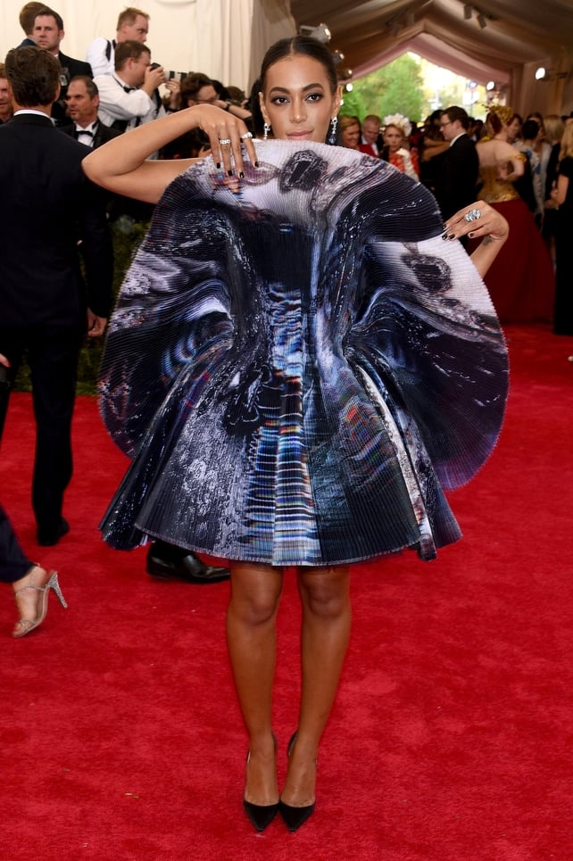 Solange attended the 2015 Met Gala in a metallic bloom dress by Giles. Theme: China: Through The Looking Glass.
