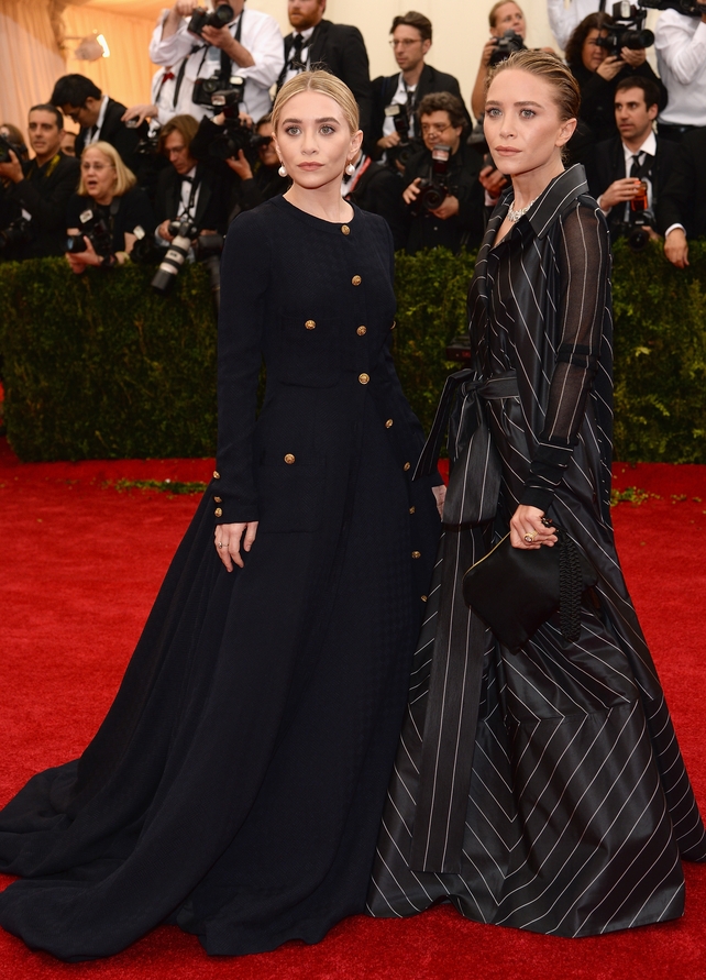 Ashley Olsen wore vintage Gianfranco Ferré while Mary-Kate Olsen wore vintage Chanel to the 2014 Met Gala. Theme: Charles James: Beyond Fashion.