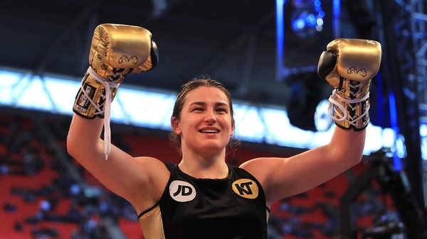 Katie Taylor celebrates her victory at Wembley Stadium