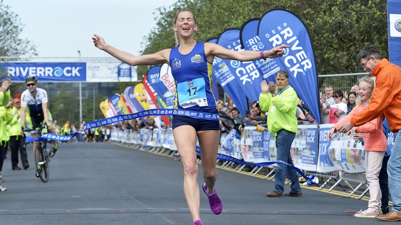Laura Graham crosses the line in the Belfast Marathon