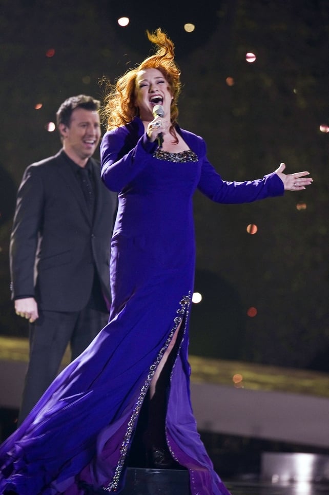 Irish singer Niamh Kavanagh knew the power of a good wind machine in 2010. Diva gown and wind blown hair - get it girl.