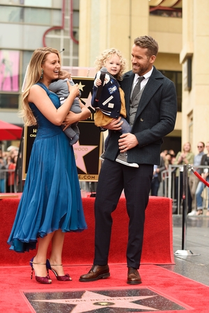 The Reynolds family pose with Ryan's star on the Hollywood Walk of Fame in 2016.