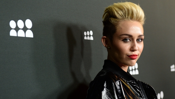 Miley Cyrus is back with a brand new look on Billboard Magazine.