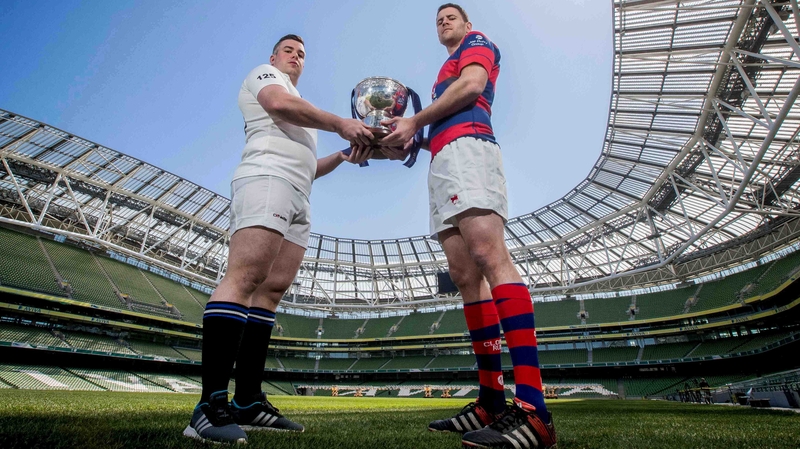 Cork Constitution's Gavin Duffy with Ben Reilly of Clontarf