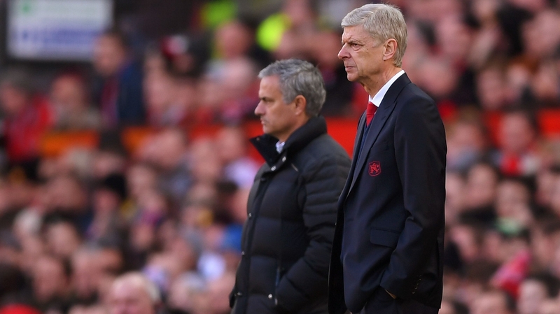 Manchester United manager Jose Mourinho (L) and Arsene Wenger