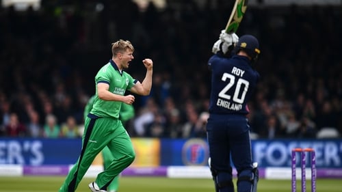 Barry McCarthy celebrates taking the wicket of England's Jason Roy