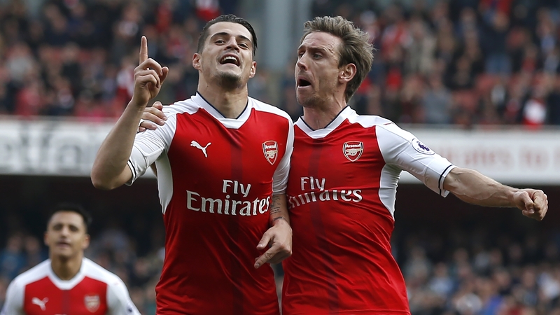 Arsenal's Granit Xhaka celebrates with Nacho Monreal