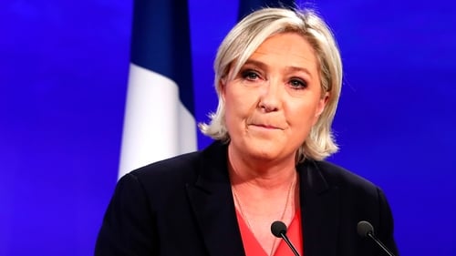 Marine Le Pen delivers a speech at the Chalet du Lac in Paris after being defeated in the French presidential elections