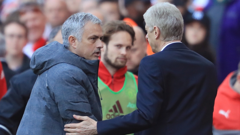 Jose Mourinho and Arsene Wenger shake hands after the game at the Emirates Stadium