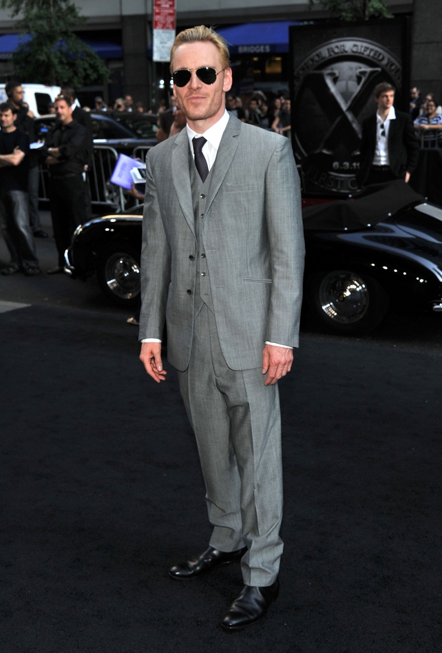 Michael Fassbender attended the 'X-Men: First Class' New York Premiere in 2011 in sunglasses, a classy grey suit and some blonde locks.
