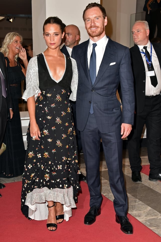 What a beautiful couple! Michael Fassbender and his girlfriend actress Alicia Vikander at the Premiere of 'The Light Between Oceans' during the 2016 Venice Film Festival. Navy blue is definitely his colour.