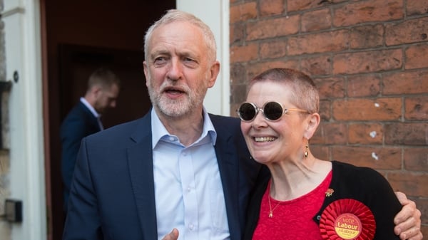Jeremy Corbyn poses with a supporter on the campaign trail