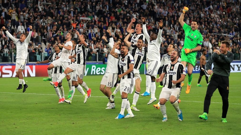 Juventus players celebrate in Turin