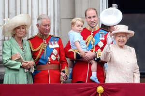 Camilla, Charles, baby George, William, Kate and Queen Elizabeth II watch the fly-past from the balcony of Buckingham Palace in 2015.