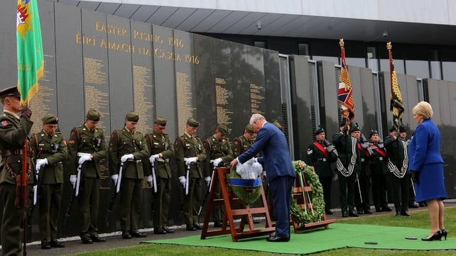 Charles lays a wreath at the Necrology Wall