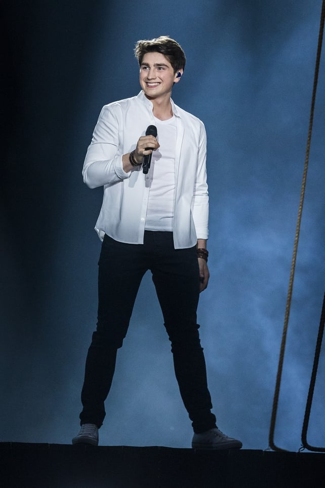 Our Galway guy, Brendan Murray, performing his song 'Dying to Try' in simple white shirt and tee. He's got that boy band look down from his Hometown days.